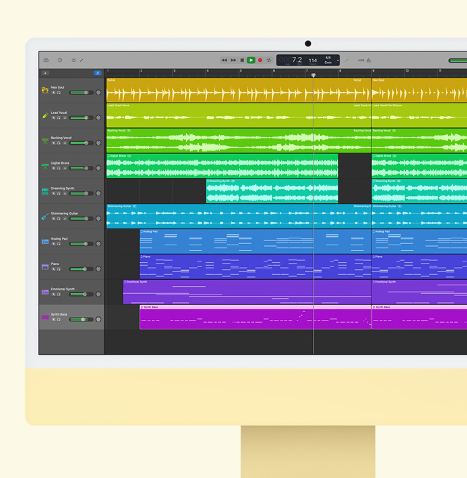 iMac jaune avec écran affichant GarageBand.
